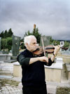 A violin player at the war cemetery