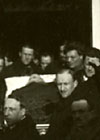 Coffin is carried from the house